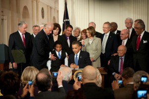 President Barack Obama delivers remarks and signs the health insurance reform bill in the East Room of the White House.